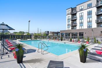 the swimming pool at theria on the park apartments